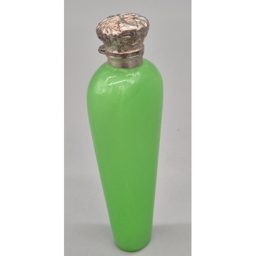 54 - 1920's Green glass and silver top perfume bottle- possibly Uranium glass. Stopper still present. [10... 