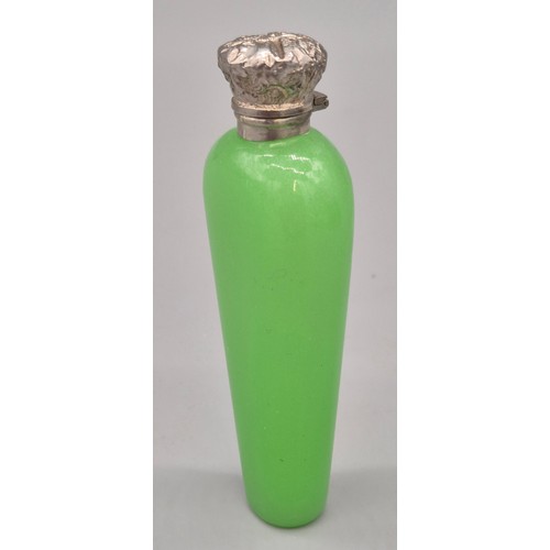 54 - 1920's Green glass and silver top perfume bottle- possibly Uranium glass. Stopper still present. [10... 