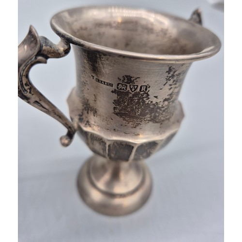 44 - Various silver hallmarked items; All Birmingham silver hallmarked- Two trophies, Sugar tongs and orn... 