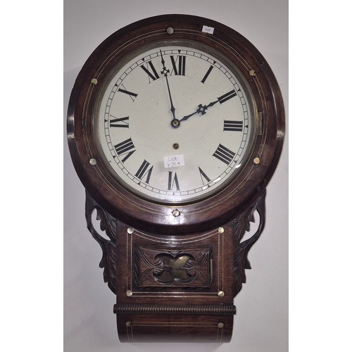 435A - A Late 19th century wall clock, comes with key and pendulum.