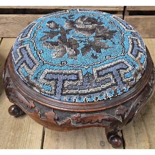 175 - A Pair of 19th century Needlework top stools. Raised hand carved wooden bases.