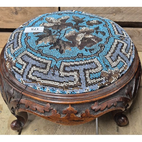 175 - A Pair of 19th century Needlework top stools. Raised hand carved wooden bases.