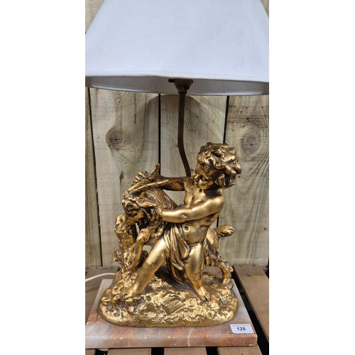 128 - Early 20th century Gilt painted Terracotta cherub & Ram figural table lamp raised on a marble base [... 