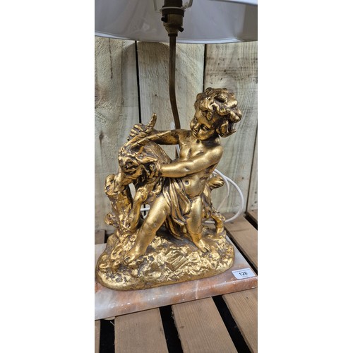 128 - Early 20th century Gilt painted Terracotta cherub & Ram figural table lamp raised on a marble base [... 