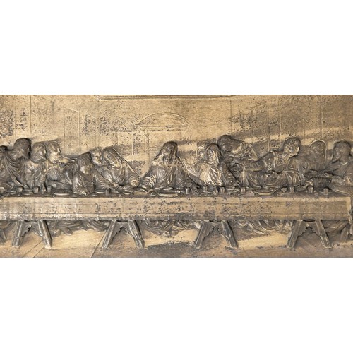 148 - Large antique silver plated raised relief last supper picture. Fitted within a black lacquered frame... 