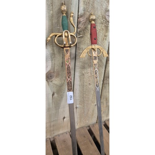 152 - A collection of two Spanish Toledo Swords with brass hilts 