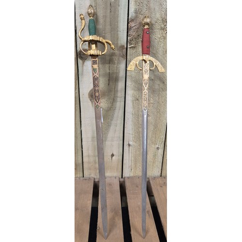 152 - A collection of two Spanish Toledo Swords with brass hilts 