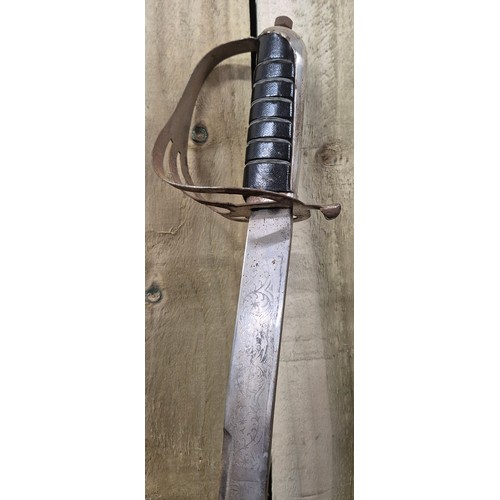 131 - A Vintage Indian Sabre sword with Scabbard together with vintage French Leon Paul 5 fencing sword [9... 