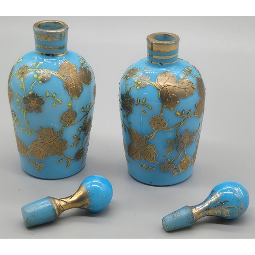 45 - Pair of 19th century Moser blue glass scent bottles with enamel gilt decoration. Circa 1880. [9cm ta... 