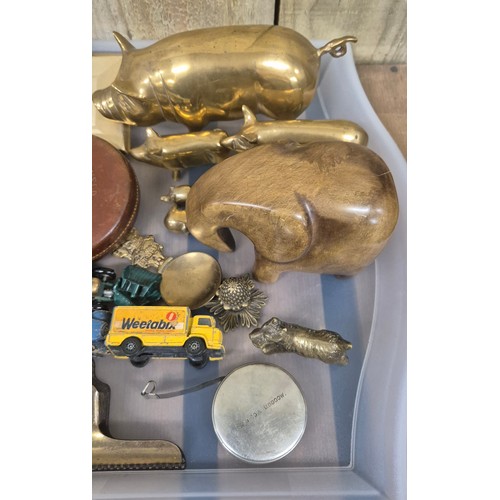 153 - Tray of collectables; Brass graduating pig models, Made in Kenya soapstone elephant sculpture, Cut t... 