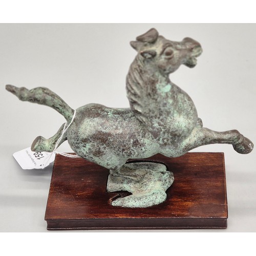 159 - Chinese bronze Tang horse raised upon a swallow bird. Comes with wooden stand. [17x18x8cm- includes ... 