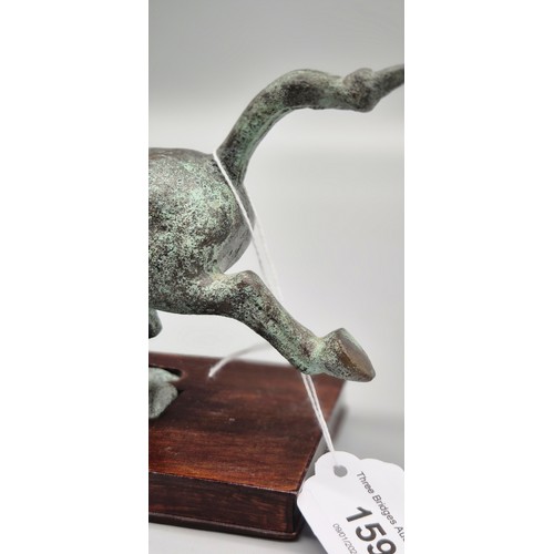 159 - Chinese bronze Tang horse raised upon a swallow bird. Comes with wooden stand. [17x18x8cm- includes ... 