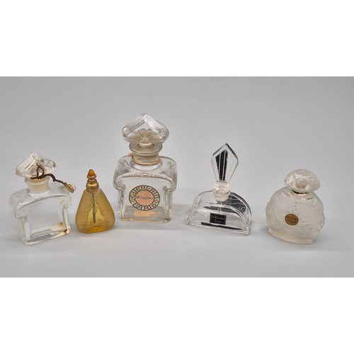 36 - A Selection of five antique and vintage glass ware perfume bottles; Two French Guerlain Art Deco Bot... 