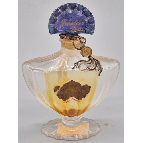 56 - A Collection of vintage perfume bottles; Baccarat Guerlain Paris scent bottle, Bourjois Blue scent b... 