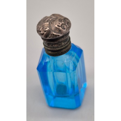 46 - A Selection of antique and vintage perfume bottles; French Amami perfume bottles, Moser blue glass a... 