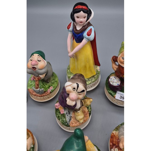 353 - Schmid collectable music figures; Snow White and the seven dwarfs and Beatrix potter