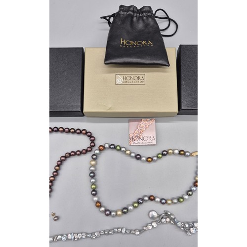 70 - Four various HONORA Freshwater cultured pearl necklaces with 14ct and silver clasps. Three 14ct yell... 