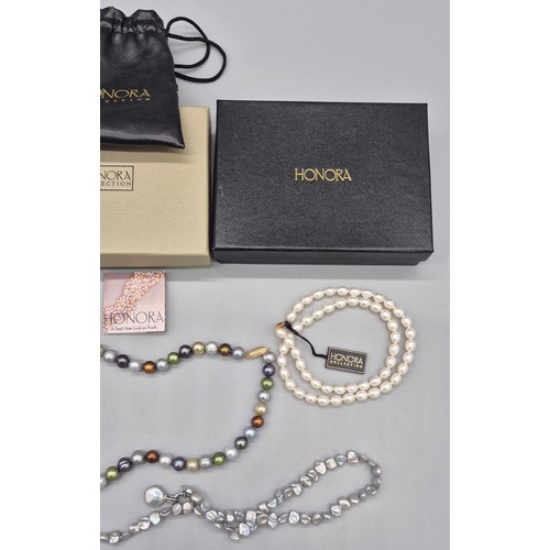 70 - Four various HONORA Freshwater cultured pearl necklaces with 14ct and silver clasps. Three 14ct yell... 