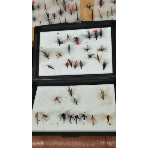 241 - A Collection of fishing flies, Shakespeare side castor reel & Wheatley alloy fly box and flies.