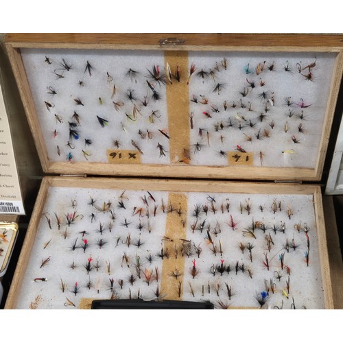 241 - A Collection of fishing flies, Shakespeare side castor reel & Wheatley alloy fly box and flies.