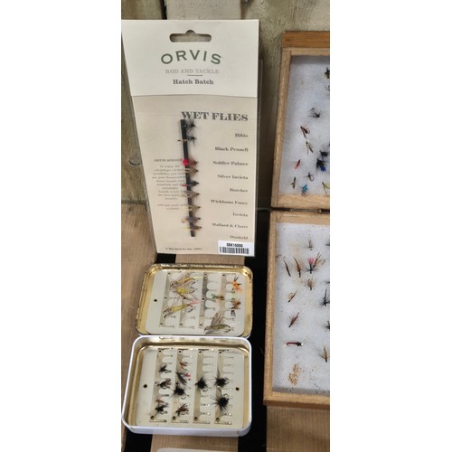 241 - A Collection of fishing flies, Shakespeare side castor reel & Wheatley alloy fly box and flies.