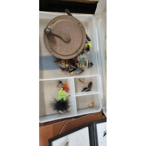 241 - A Collection of fishing flies, Shakespeare side castor reel & Wheatley alloy fly box and flies.