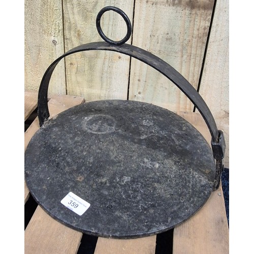 359 - Two antique cast Iron skillets.