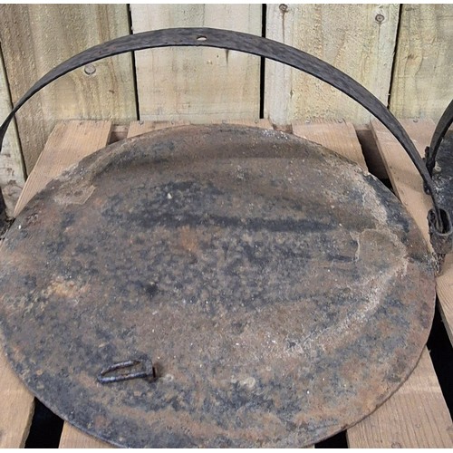 359 - Two antique cast Iron skillets.