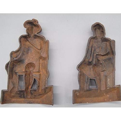 239 - Two Victorian Cast iron Character door stops. [25cm high]