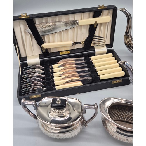 171 - Four piece silver plated coffee and tea service. Together with a boxed Fork, knives and serving set.