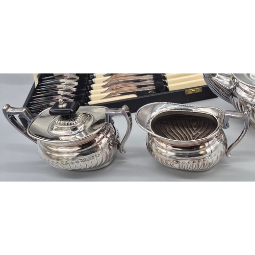 171 - Four piece silver plated coffee and tea service. Together with a boxed Fork, knives and serving set.