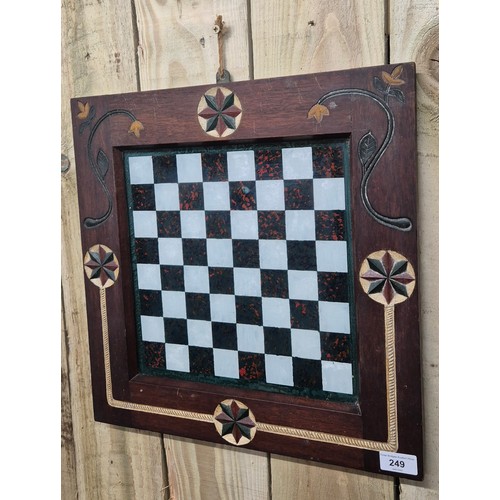 249 - Antique hand painted chess board fitted within a carved wood and hand painted frame. [Frame- 43x43cm... 