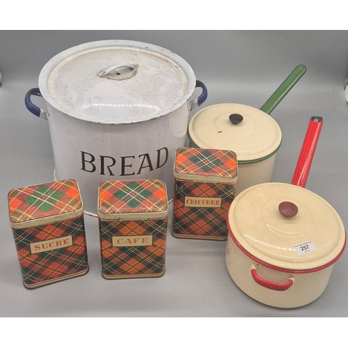 257 - Two vintage enamel lidded cooking pots, Large lidded bread bin and three tartan preserve tins.