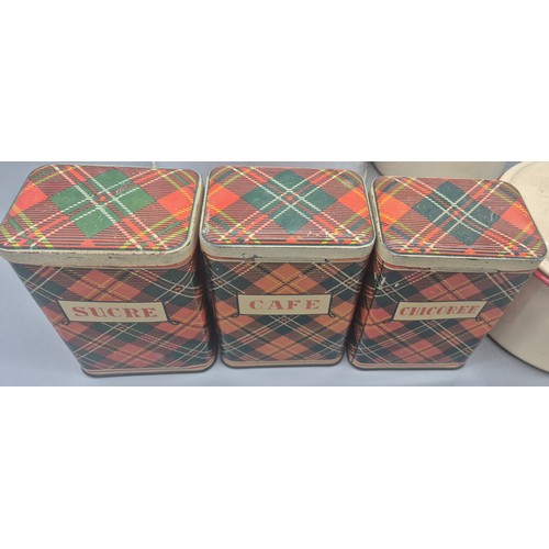 257 - Two vintage enamel lidded cooking pots, Large lidded bread bin and three tartan preserve tins.