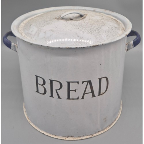 257 - Two vintage enamel lidded cooking pots, Large lidded bread bin and three tartan preserve tins.