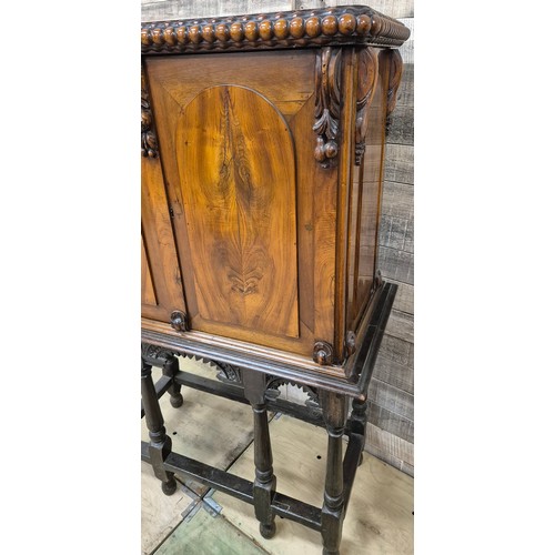 175 - 19th century Mahogany collectors cabinet. Carved bobble trim top, two doors opening to reveal a coll... 