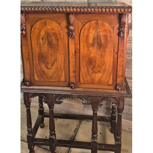 175 - 19th century Mahogany collectors cabinet. Carved bobble trim top, two doors opening to reveal a coll... 