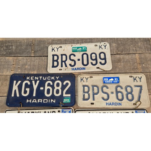 261 - A Lot of Five American reg plates and British raised reg plate. Maryland and Kentucky.