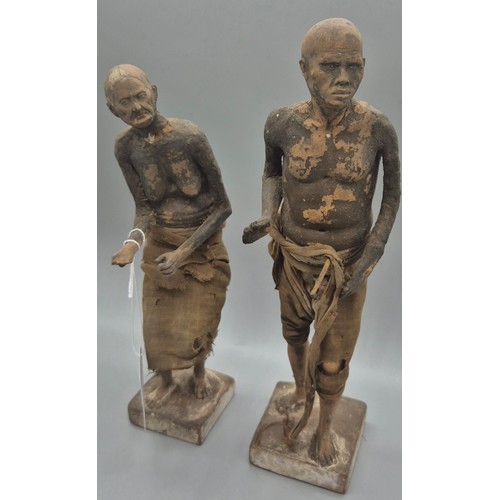 188 - Two 18th/19th century Chinese Terracotta figures. Having lower half of their bodies wrapped in a can... 