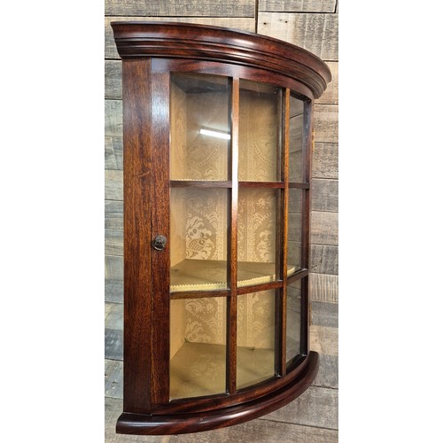 203 - Reproduction of a Victorian Mahogany wall corner cabinet. Fitted with interior shelves and gold mate... 