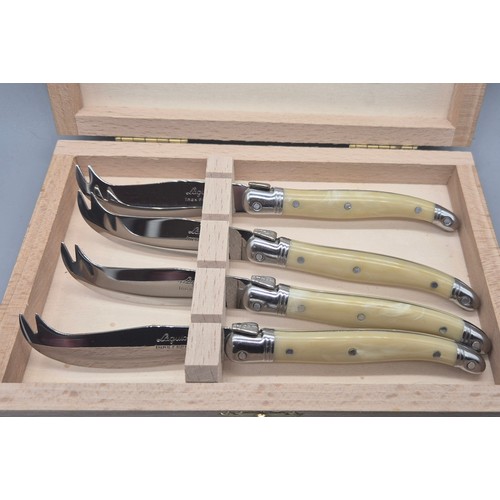 216 - Boxed Set of four Laguiole Jean Dubost Cheese knives.