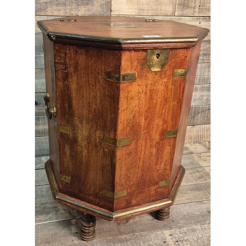 172 - Reproduction octagonal Mahogany and brass bound campaign table box. Brass handles to the sides. Rais... 