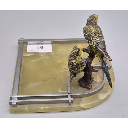 91 - Art Deco cold painted bronze sculpture of two parrots raised on a chrome and onyx base. [10cm high]