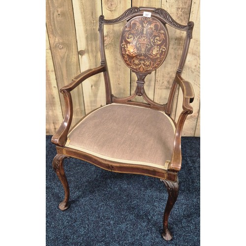 347 - 19th century Victorian mahogany and highly decorative splat back arm chair. Designed with urns, flow... 