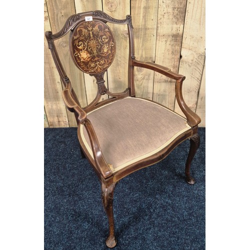 347 - 19th century Victorian mahogany and highly decorative splat back arm chair. Designed with urns, flow... 