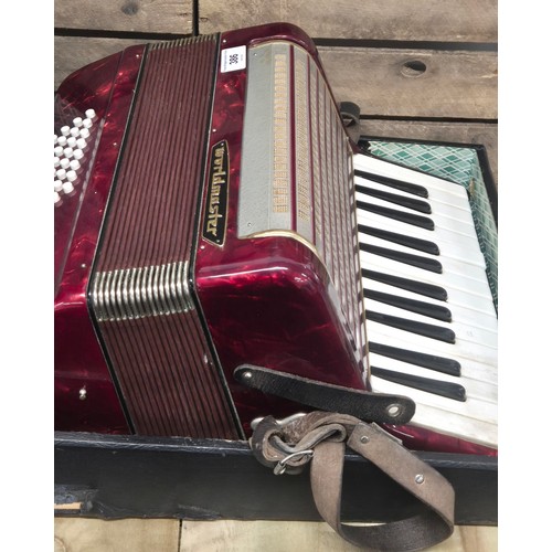 386 - World master Accordion in fitted case