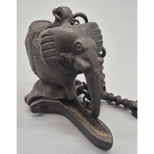 106 - Indian bronze elephant shaped hanging burner.