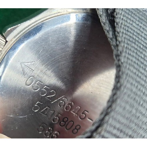 11 - Military CWC Quartz watch. Details engraved to back plate.