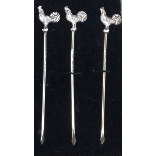 16 - Boxed set of six Sterling silver tooth picks details with cockerel finials.