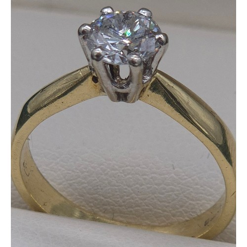 6 - 18ct yellow gold solitaire diamond ring. 0.75ct diamond. Round cut. [Ring size M] [3.71grams]